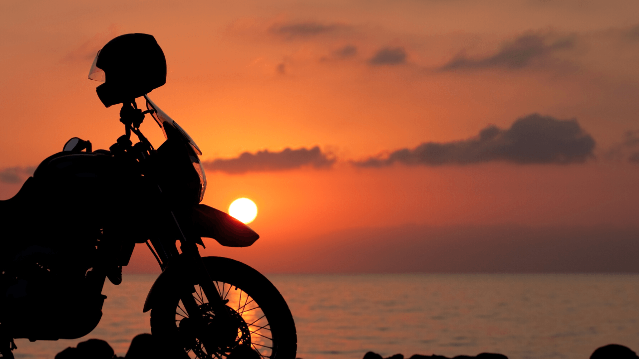 Quantos km por dia para viajar de moto